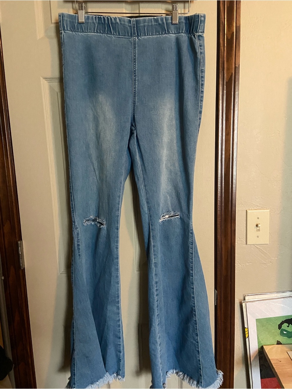 Light Blue Flare Jeans with Distressed Knees
